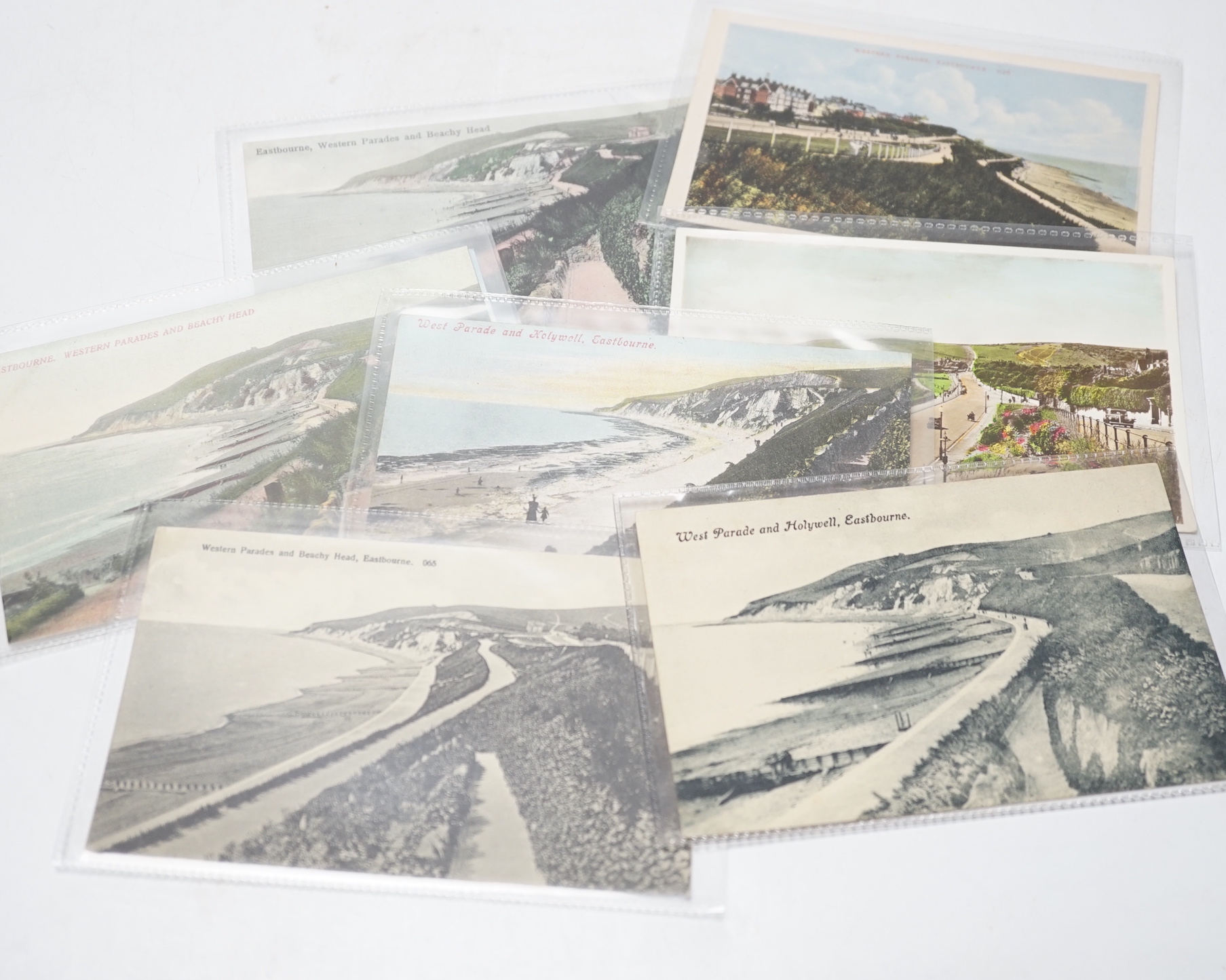A large quantity of early to mid 20th century postcards of Eastbourne and the surrounding area, all in individual protective sleeves (in two boxes)
